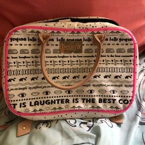 hanging Benefit makeup bag